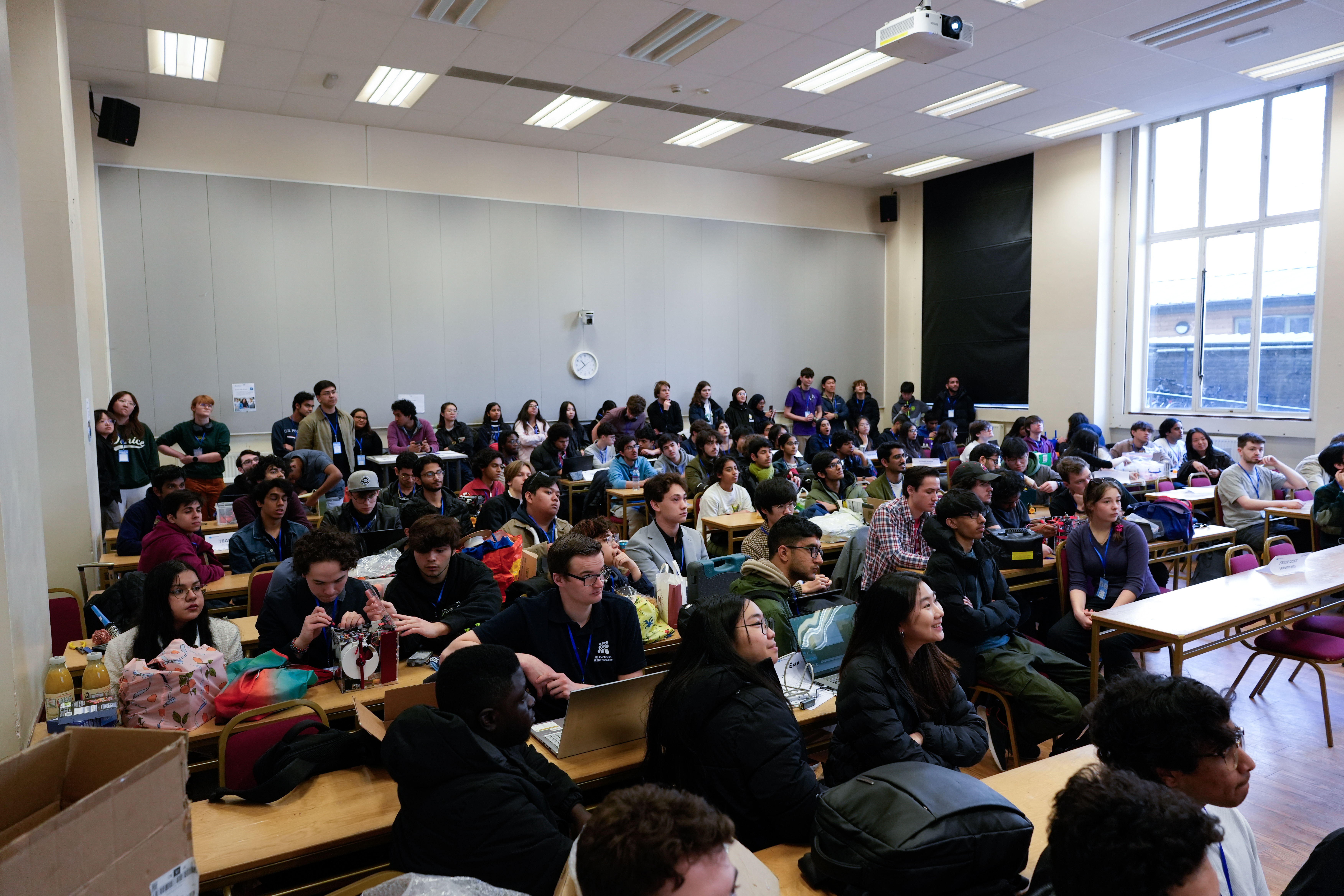 Students listening to a sponsor talk
